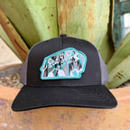 Black cap with turquoise-edged buffalo patch featuring an Aztec-inspired geometric pattern — Blair's Western Wear Marble Falls TX