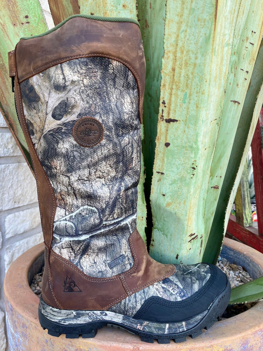 Men's Rocky Boots, Snake-proof, Zip 16" boots in mossy oak and brown, featuring high abrasion snake guard and waterproof full grain leather - RKS0617. Available at Blair's Western Wear, Marble Falls, TX.