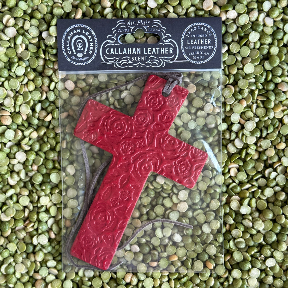 Callahan Leather Cross Air Freshener in Red Rose Leather, handcrafted from full-grain vegetable-tanned leather, infused with premium fragrance oil, featuring an embossed rose pattern - AFCROSSRED. Available at Blair's Western Wear, Marble Falls, TX.