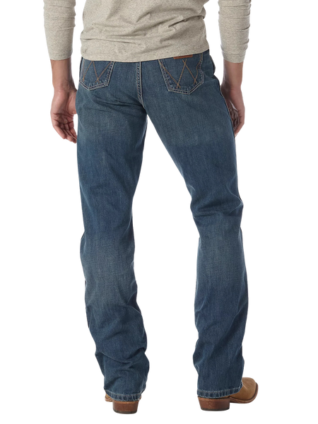 Men's relaxed fit Wrangler Retro bootcut blue jean with W-stitch back pockets, mid rise, and boot-friendly leg opening — Blair's Western Wear Marble Falls TX