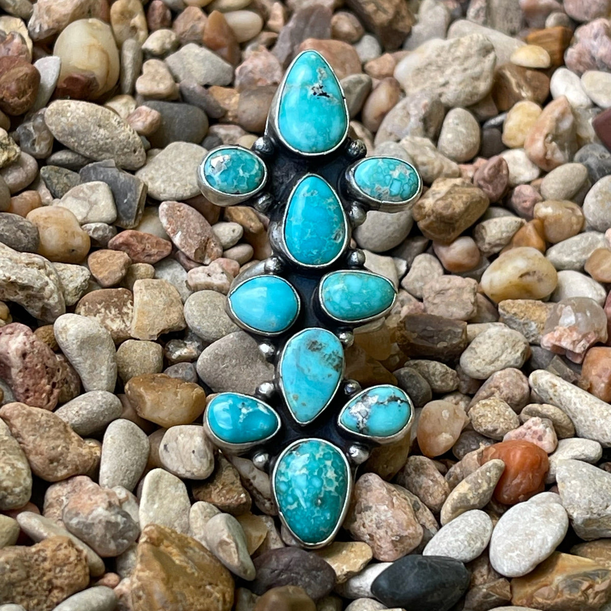Women's Select Lines Jewelry Turquoise Cluster Ring in sterling silver, featuring ten hand-set turquoise stones, with a dual-band shank for comfort and support - SELRN10STN. Available at Blair's Western Wear, Marble Falls, TX.