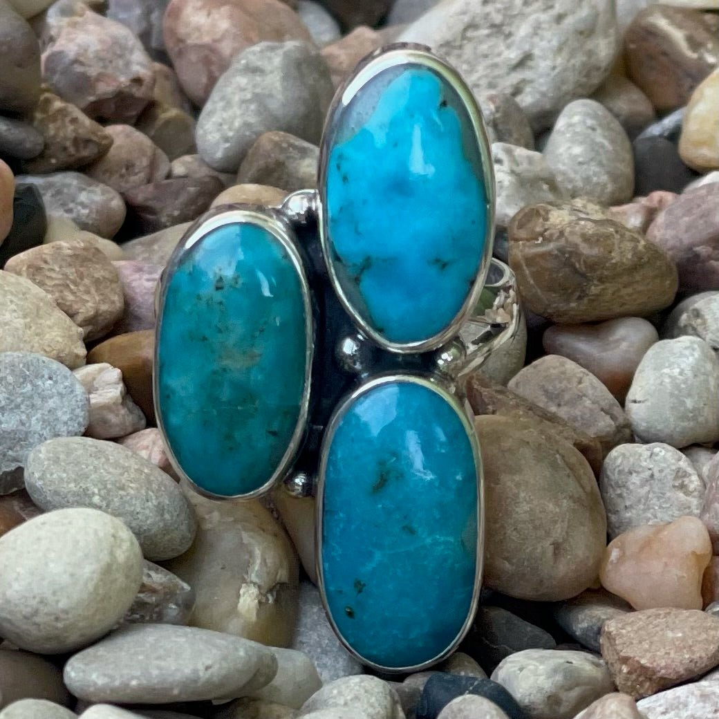 Women's Silver Star Jewelry Ring Turquoise Cluster Ring in Silver, handcrafted from solid sterling silver, with three genuine oval turquoise stones - STARRN3OVL. Available at Blair's Western Wear, Marble Falls, TX.