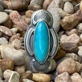 Women's Silver Star Jewelry Ring Turquoise/Silver Oval Shell in turquoise, handcrafted with intricate silver shell detailing, with a genuine turquoise center stone - STARRNSHELL. Available at Blair's Western Wear, Marble Falls, TX.