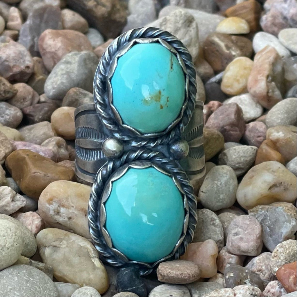 Women's Sunwest Silver Ring Turquoise Double Oval Rope Sterling Ring in Silver/Turquoise, handcrafted with two natural turquoise stones, with stamped split-shank band detail for strength and style - SUNRN2CIR. Available at Blair's Western Wear, Marble Falls, TX.