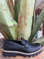 Women's black-and-tan slip-on penny loafer with a chunky sole — Blair's Western Wear Marble Falls TX