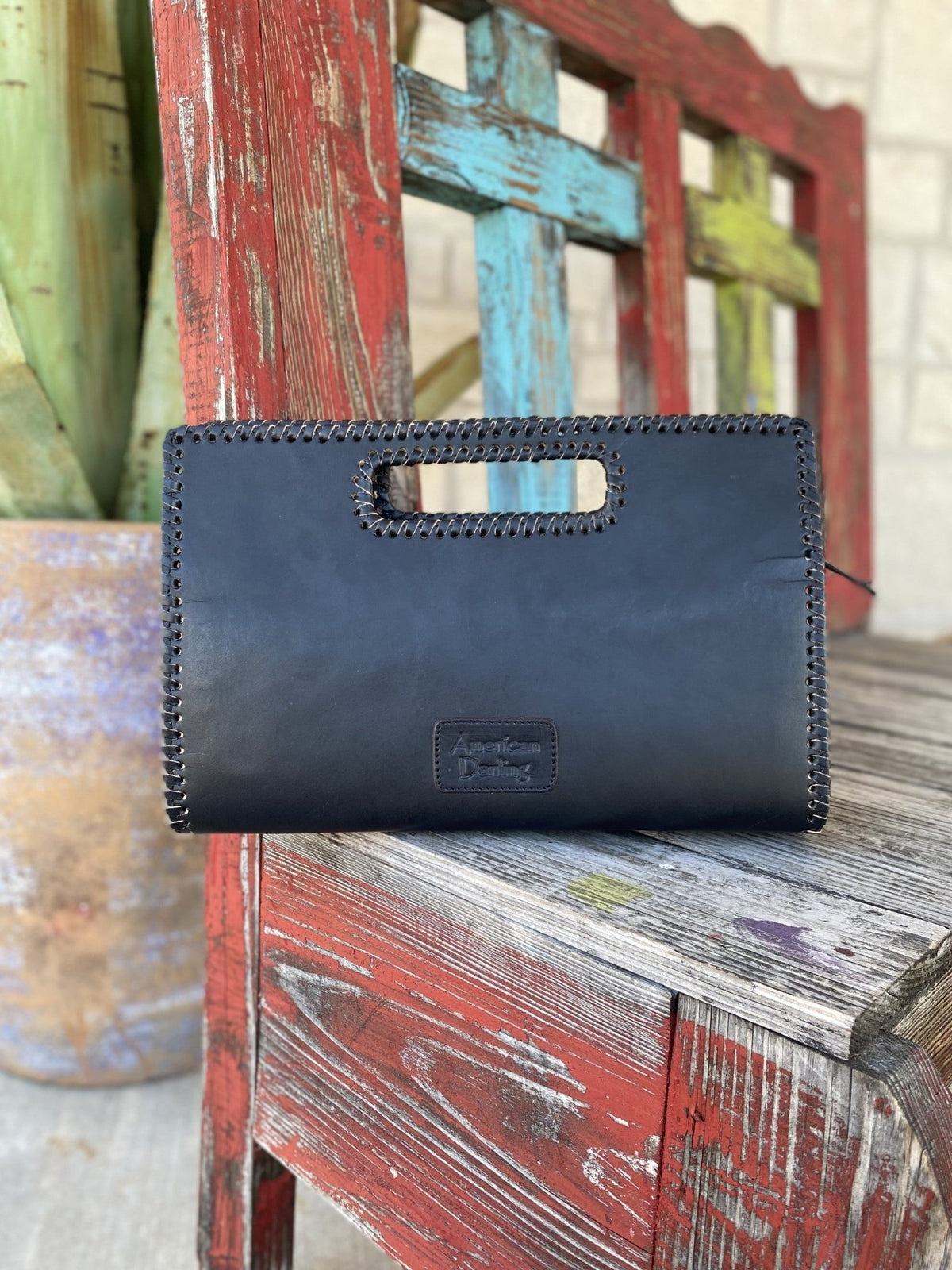Women's Black Tooled Leather Clutch