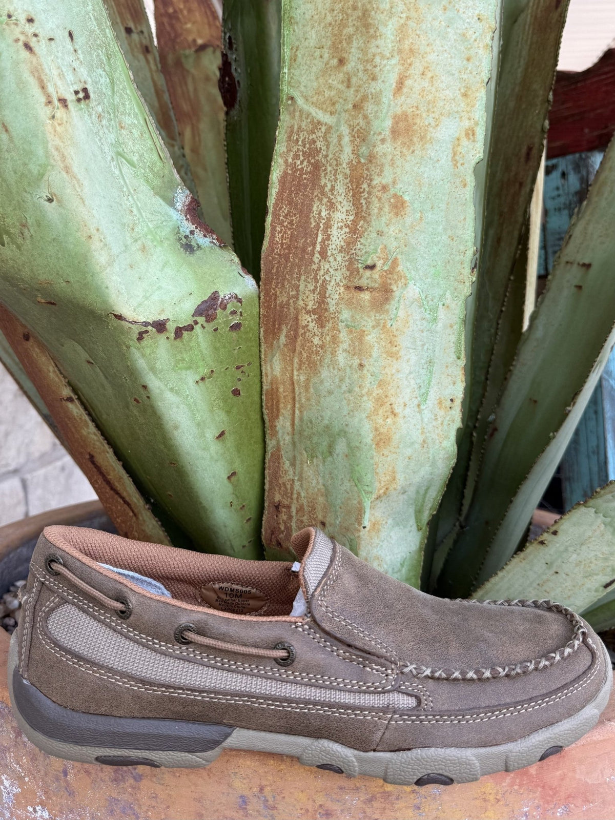 Women's brown leather slip-on driving moccasin with a rounded toe and low-profile rubber sole — Blair's Western Wear Marble Falls TX