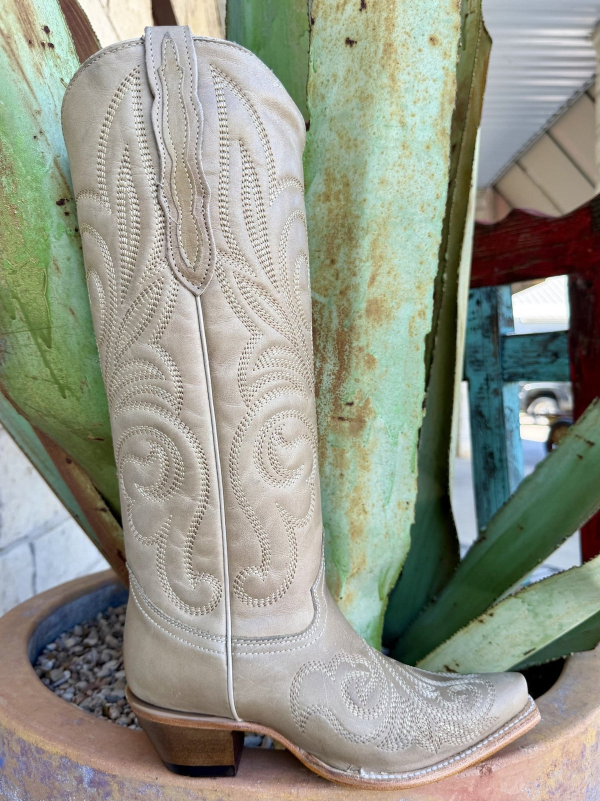 Side view of bone-natural tall Western boot with tonal scroll embroidery, snip toe, side pull tab and brown heel — Blair's Western Wear Marble Falls TX