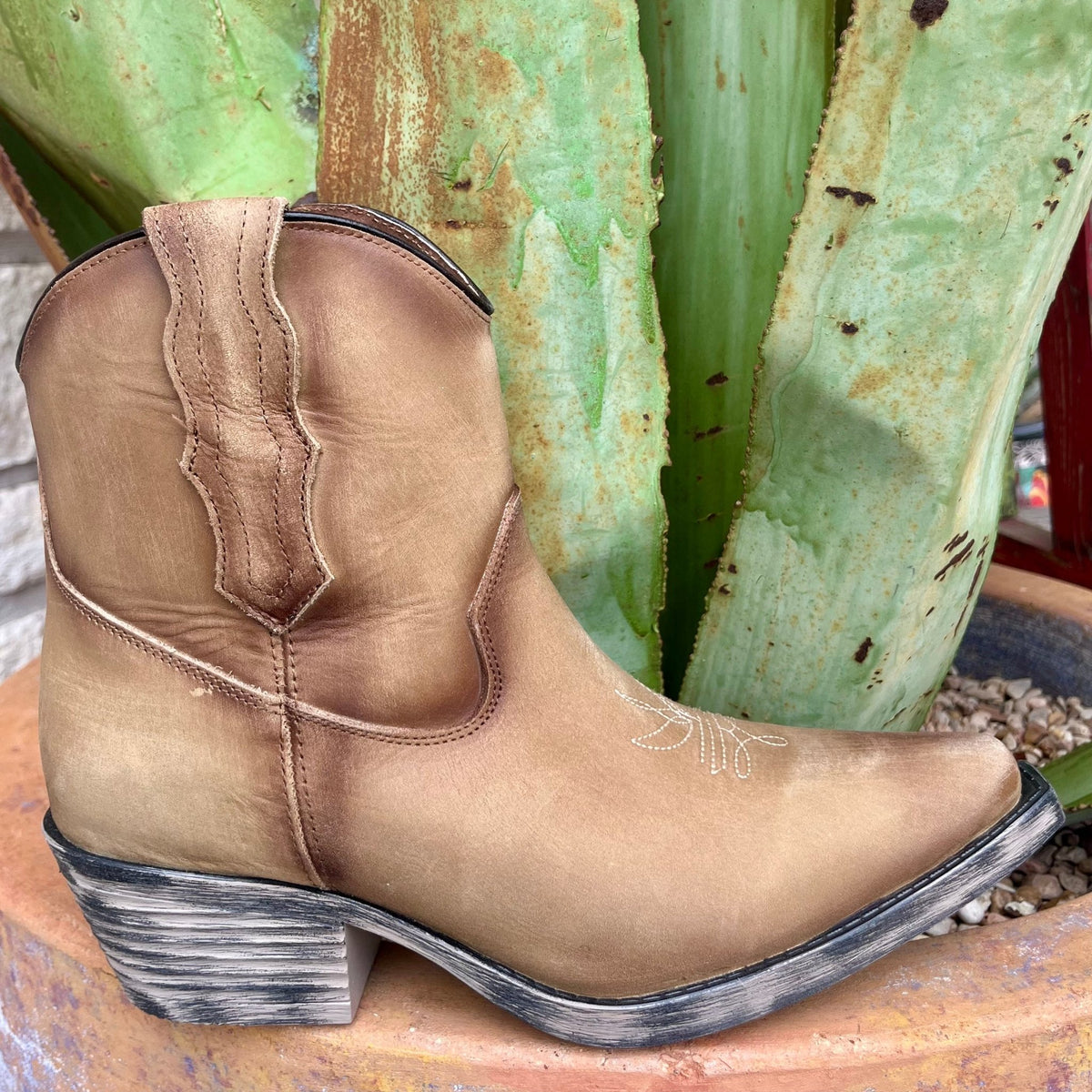 Women’s Corral Western Bootie Zip Boots in distressed tan leather, stylized toe stitching for flair, with convenient zipper closure for easy wear - Q7037. Available at Blair's Western Wear, Marble Falls, TX.