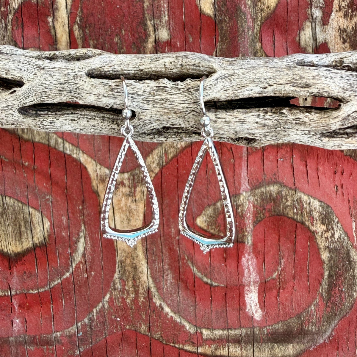 Women's silver-tone open drop earrings with elongated tapered frames, textured edges, turquoise-colored lower accents, and fishhook ear wires — Blair's Western Wear Marble Falls TX