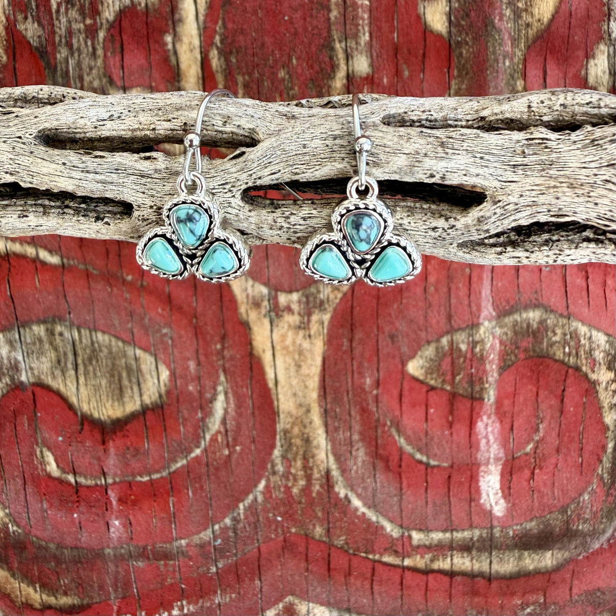 Women's silver-tone cluster drop earrings with three rounded triangular turquoise-colored accents, dark veining, rope-style borders, and fishhook ear wires — Blair's Western Wear Marble Falls TX
