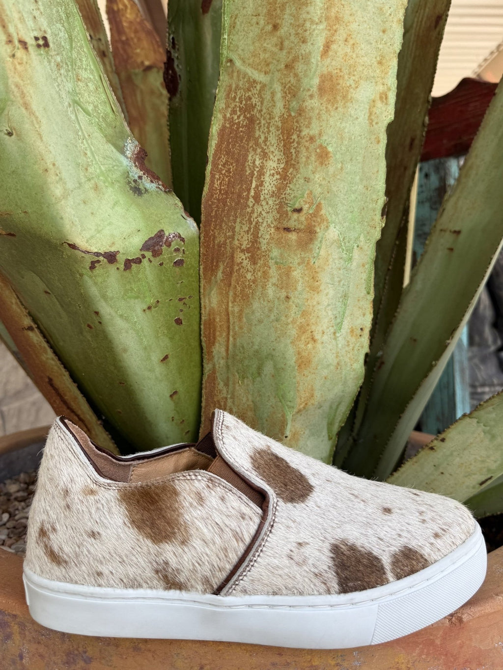 Women's brown-and-white salt-and-pepper cowhide slip-on sneaker with elastic side panels — Blair's Western Wear Marble Falls TX
