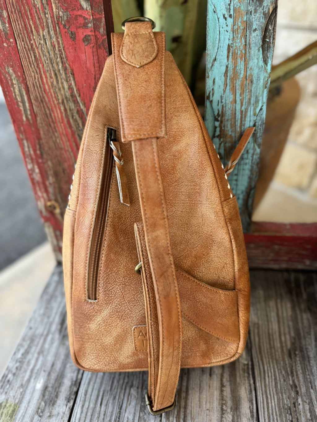 Women's Tan Leather Whipstitch Sling Bag