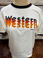Ladies Rodeo Hippie short sleeve graphic tee in natural with black trim, soft breathable cotton blend, featuring bold Western repeat graphic in rust and black tones – WESTERN3. Available at Blair's Western Wear, Marble Falls, TX.