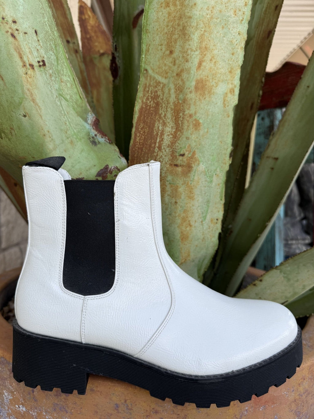 Women's white-and-black pull-on bootie with elastic side panels and a chunky sole — Blair's Western Wear Marble Falls TX