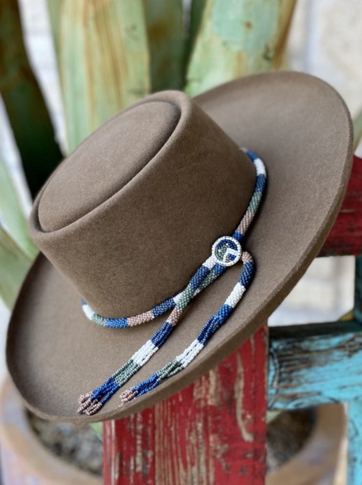 Brown felt hat, angled view, with telescope crown, rolled brim and multicolored beaded band — Blair's Western Wear Marble Falls TX