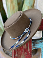 Brown felt hat, angled view, with telescope crown, rolled brim and multicolored beaded band — Blair's Western Wear Marble Falls TX